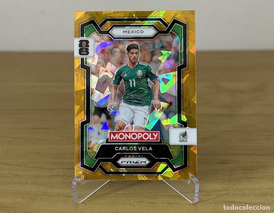 Cromos de Futebol: Carlos Vela Gold Cracked Ice &ndash; Panini Prizm Monopoly FIFA World Cup 2026