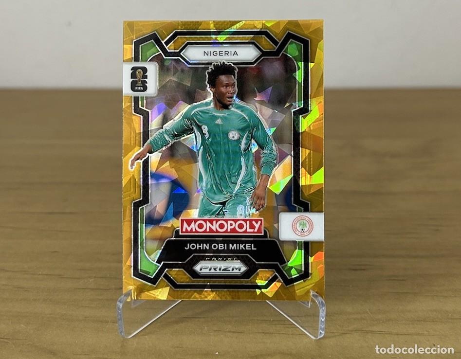 Figurine di Calcio: John Obi Mikel Gold Cracked Ice &ndash; Panini Prizm Monopoly FIFA World Cup 2026
