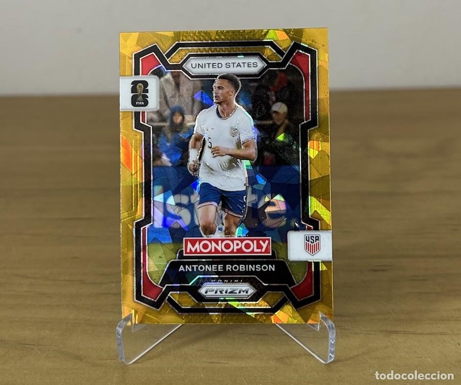 Cromos de Futebol: Antonee Robinson Gold Cracked Ice &ndash; Panini Prizm Monopoly FIFA World Cup 2026