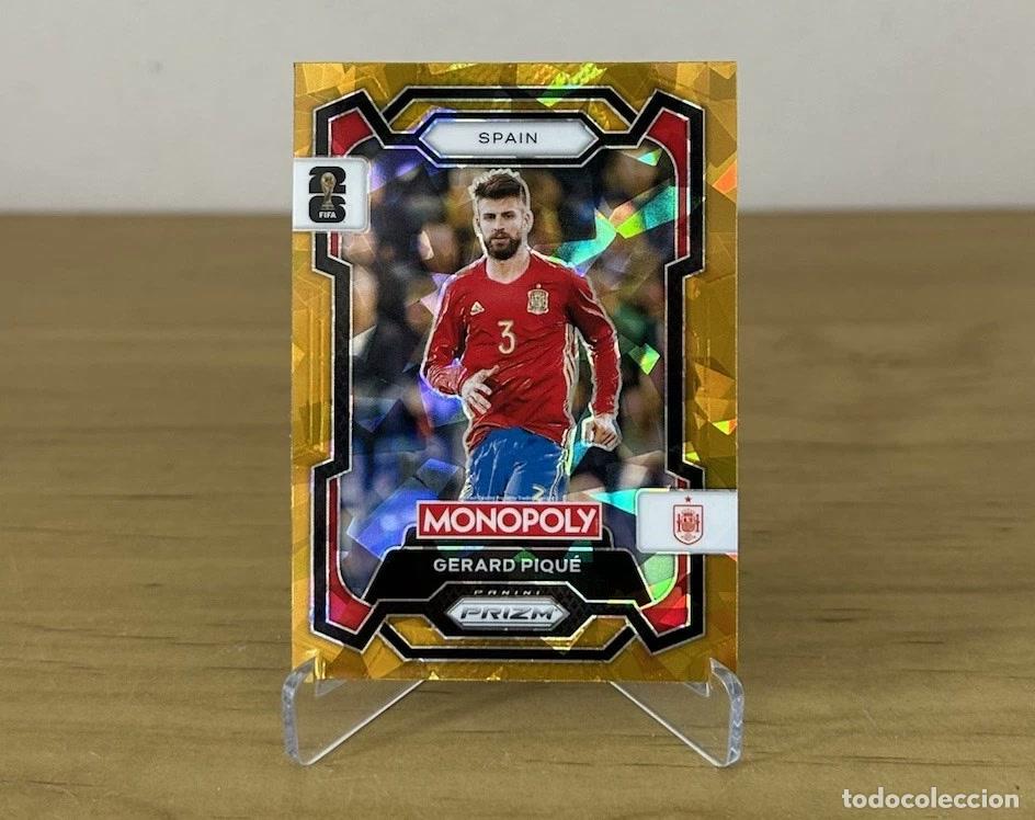 Cartes &agrave; collectionner de Football: Gerard Piqu&eacute; Gold Cracked Ice &ndash; Panini Prizm Monopoly FIFA World Cup 2026
