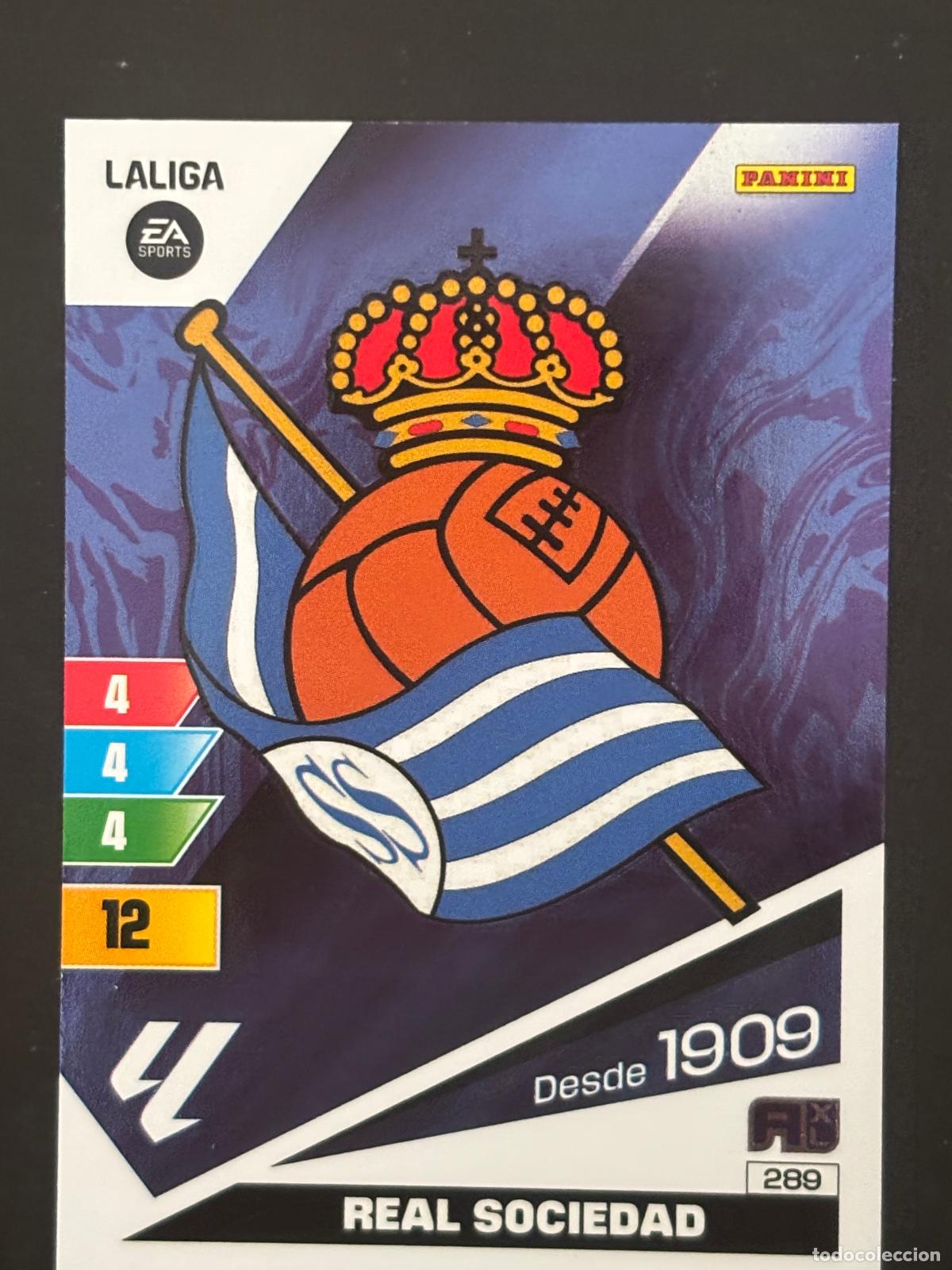 Fu&szlig;ball-Sticker: 289 ESCUDO REAL SOCIEDAD ADRENALYN XL LALIGA EA SPORTS 23-24 2023-2024 PANINI