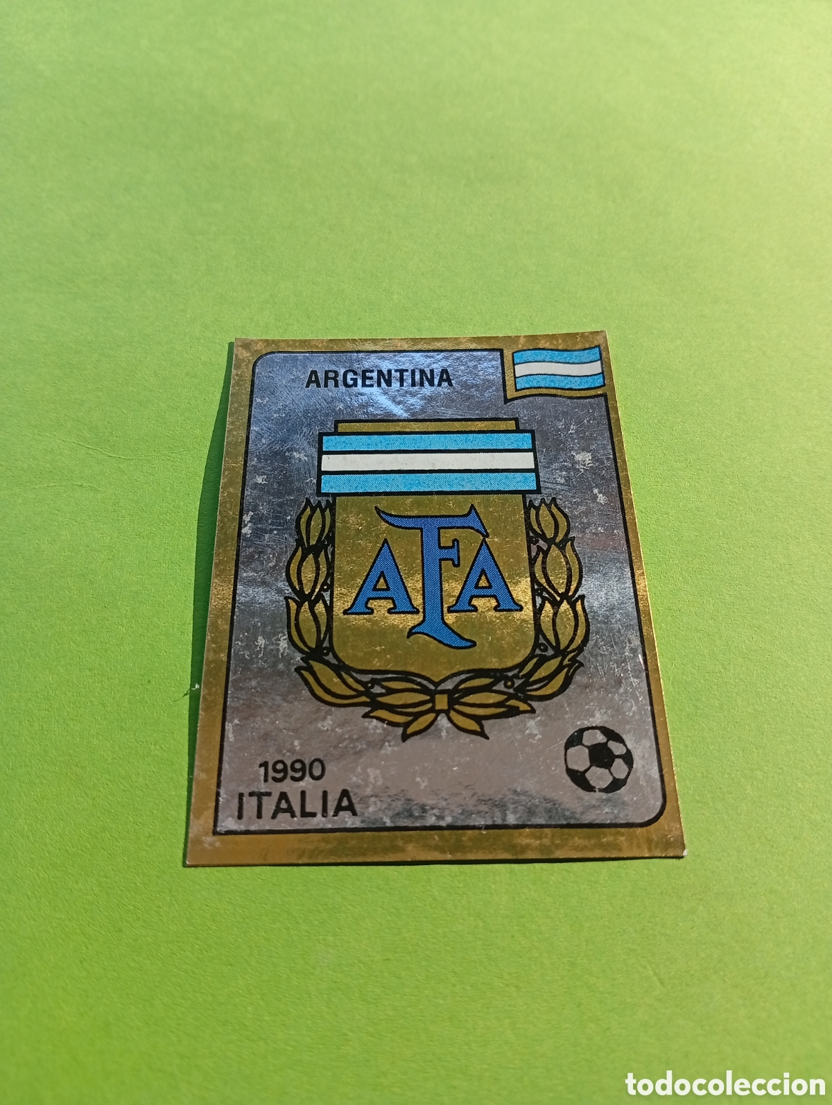Cromos de Futebol: 1990 ITALIA 90 - N&ordm; 114 ESCUDO - ARGENTINA - ED. CARVAJAL / PANINI