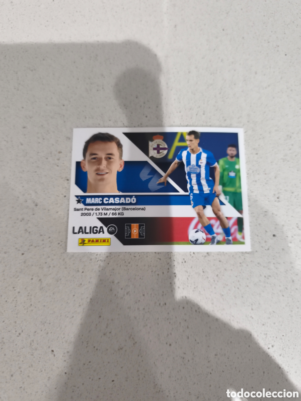 Cromos de f&uacute;tbol: CROMO N&Uacute;MERO 14 BIS B COLOCA CASAD&Oacute; DEPORTIVO. LIGA ESTE 26/27. PANINI. CUARTA EDICI&Oacute;N.