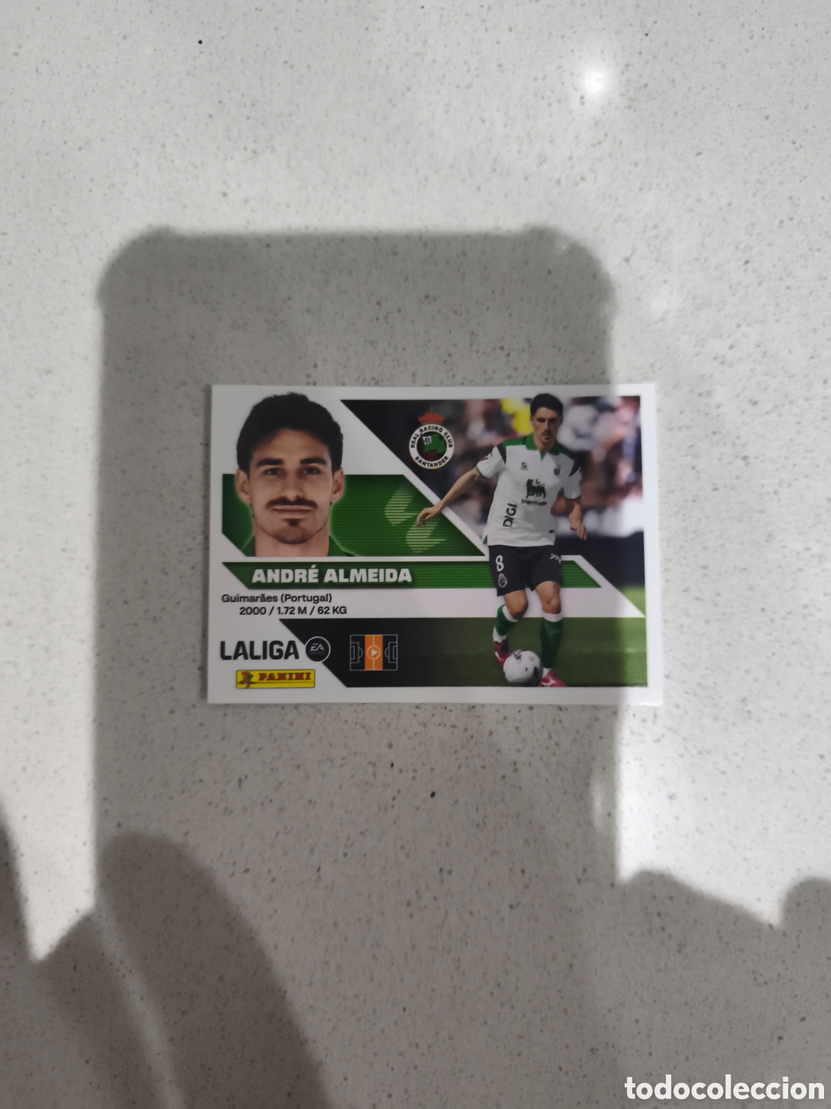 Cromos de f&uacute;tbol: CROMO N&Uacute;MERO 14 BIS COLOCA ANDR&Eacute; ALMEIDA RACING SANTANDER. LIGA ESTE 26/27. PANINI. CUARTA EDICI&Oacute;N.