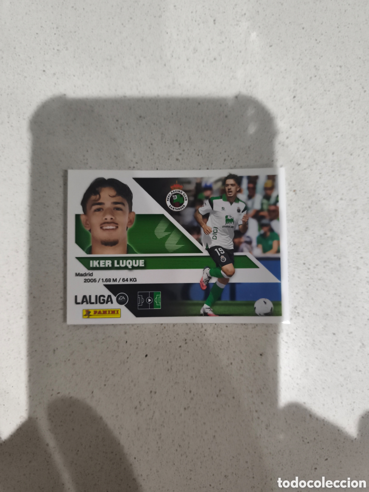 Cromos de f&uacute;tbol: CROMO N&Uacute;MERO 19 BIS COLOCA IKER LUQUE RACING SANTANDER. LIGA ESTE 26/27. PANINI. CUARTA EDICI&Oacute;N.