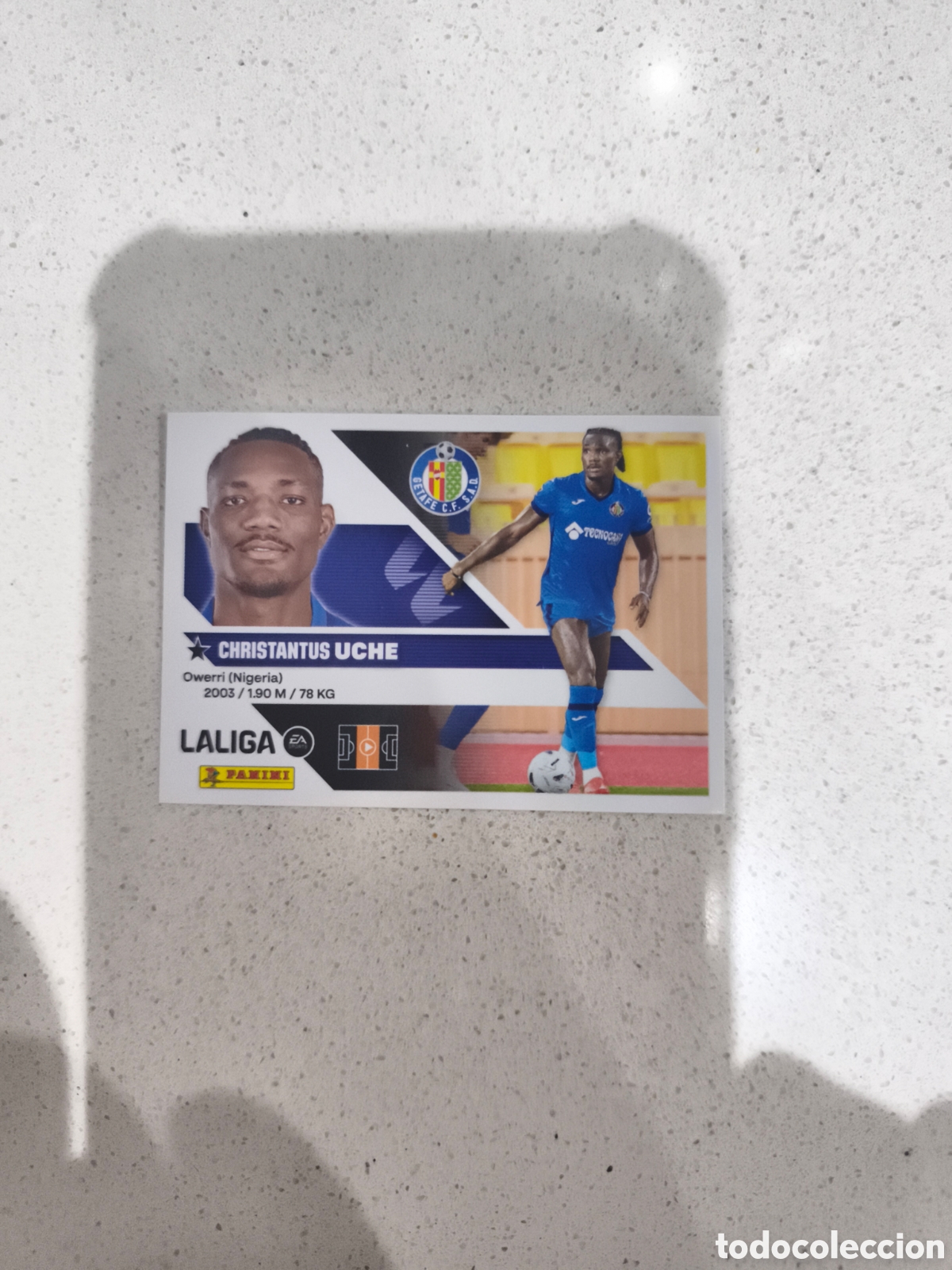 Cromos de f&uacute;tbol: CROMO N&Uacute;MERO 12 BIS COLOCA UCHE GETAFE. LIGA ESTE 26/27. PANINI. CUARTA EDICI&Oacute;N.
