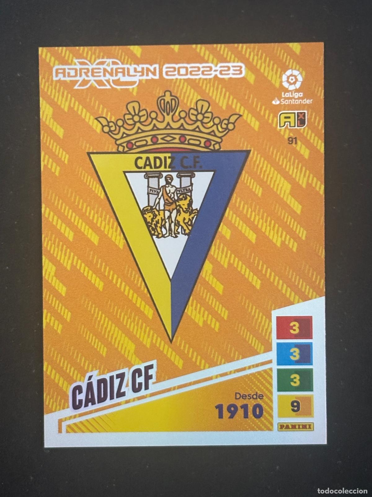 Figurine di Calcio: 91 ESCUDO CADIZ ADRENALYN XL LALIGA SANTANDER 22-23 2022-2023 PANINI