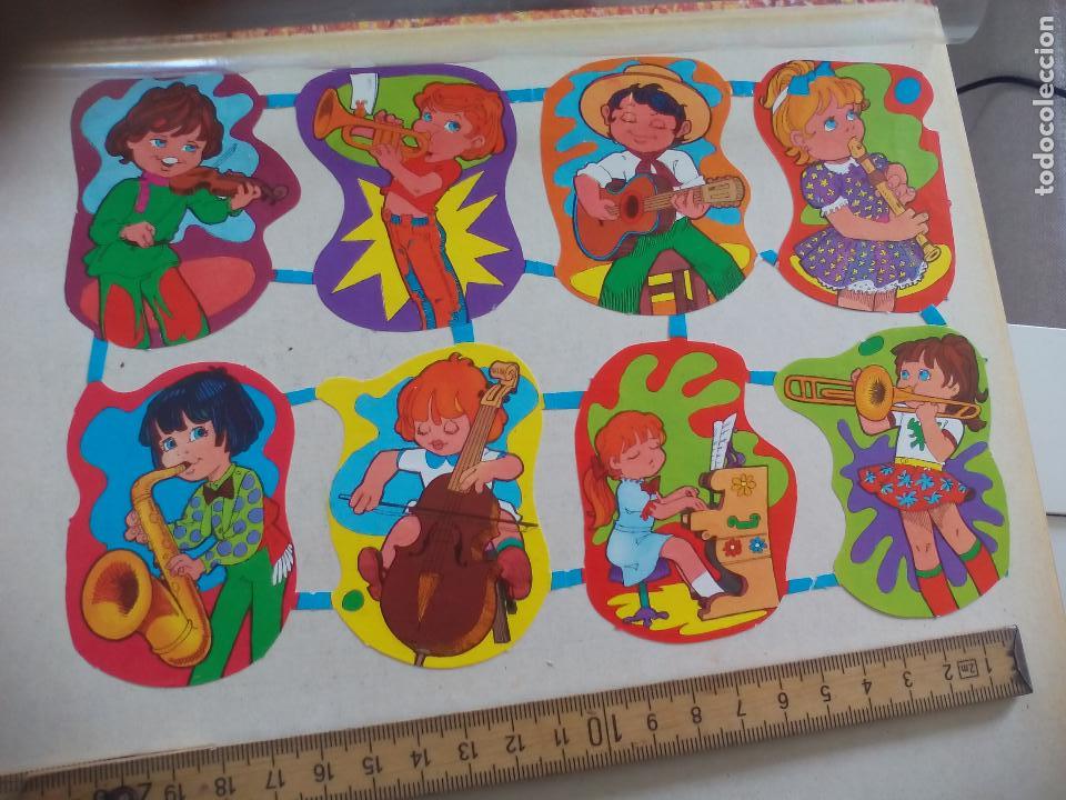 Colecionismo Cromos recortados antigos: NI&Ntilde;OS M&Uacute;SICOS, INSTRUMENTOS MUSICALES. LAMINA DE CROMOS TROQUELADOS CREO QUE DE EDIVAS