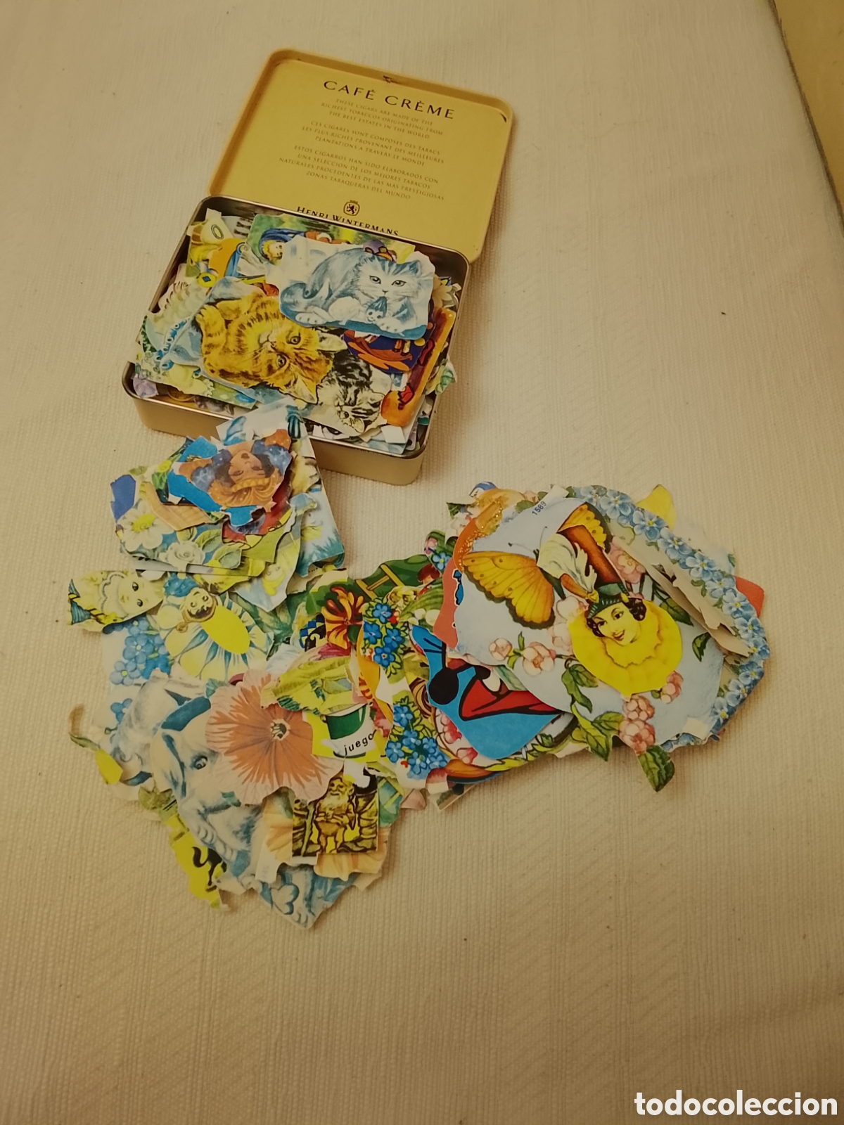 Coleccionismo cromos troquelados antiguos: Caja de hojalata con 225 cromos troquelados.