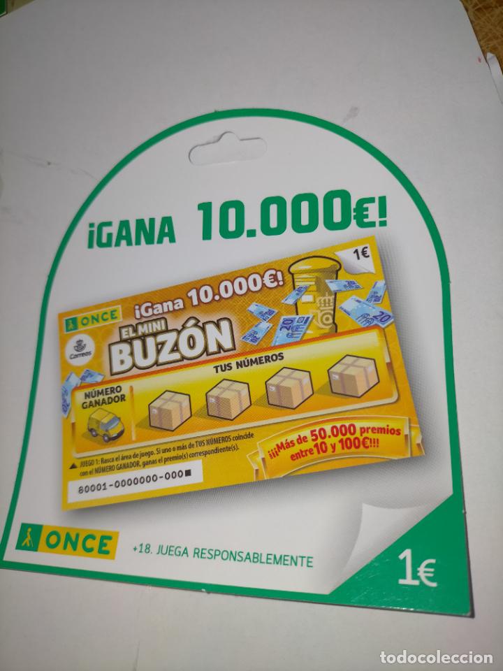 ONCE Coupons: publicidad carton troquelado once buz&oacute;n de 1 euros
