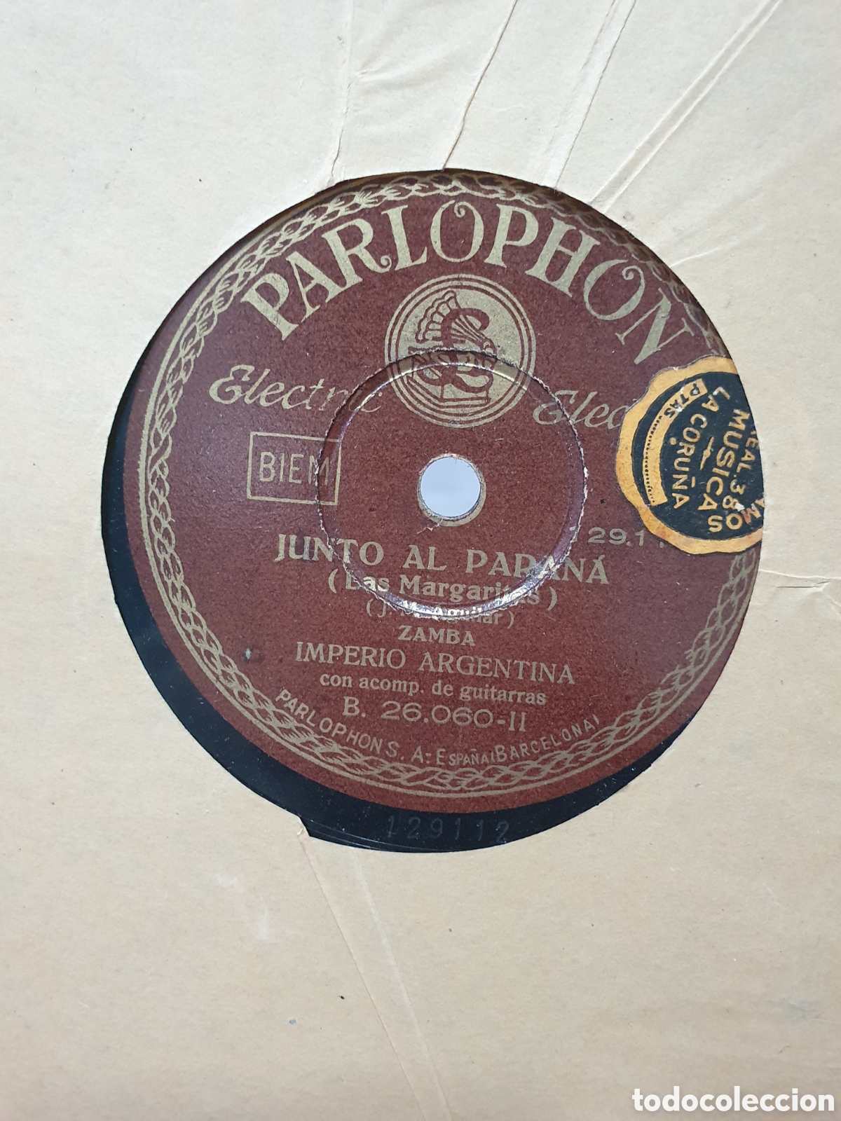 Shellac records: Junto al Paran&aacute; y Dorita. Disco de pizarra