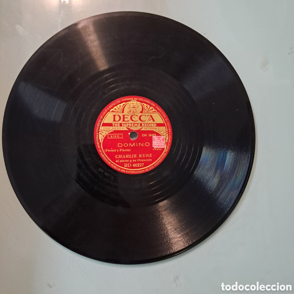 Discos de pizarra: Disco Pizarra, En sus brazos, Dominio