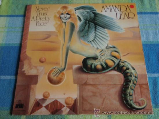 Discos de vinilo: AMANDA LEAR ( NEVER TRUST A PRETTY FACE ) 1979-GERMANY LP33 ARIOLA RECORDS - Foto 1