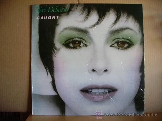 Discos de vinilo: TERI DESARIO ---- CAUGHT - Foto 1