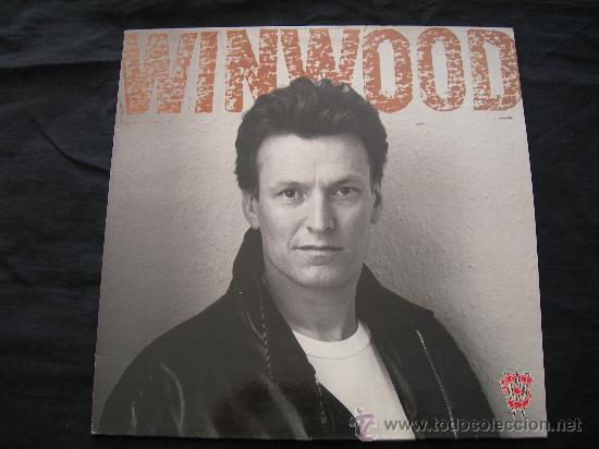 Discos de vinilo: LP STEVE WINWOOD // ROLL WITH IT - Foto 1