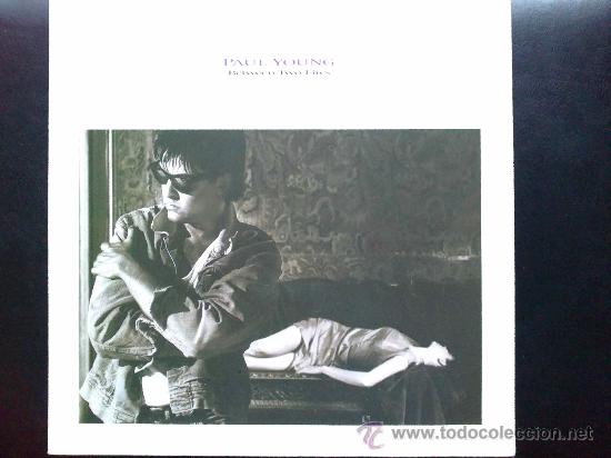 Discos de vinilo: PAUL YOUNG - BETWEEN TWO FIRES - LP - Foto 1