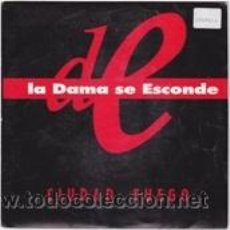 Discos de vinilo: LA DAMA SE ESCONDE CIUDAD FUEGO (WEA 1990)