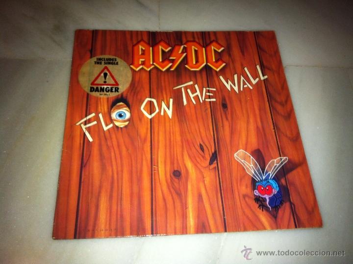 Discos de vinilo: AC/DC FLO ON THE WALL - Foto 1
