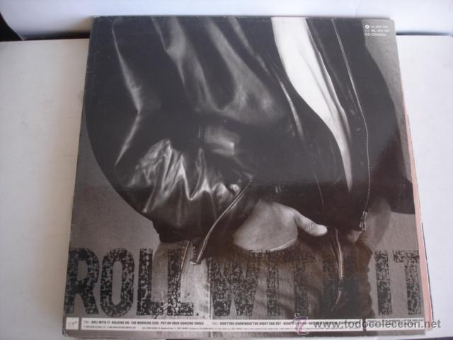 Discos de vinilo: Steve Winwood    Roll With It - Foto 2