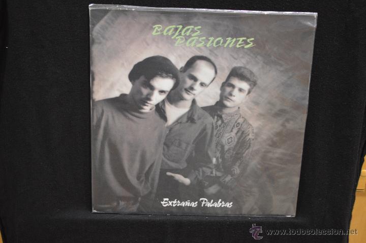 Discos de vinilo: BAJAS PASIONES - EXTRA&Ntilde;AS PALABRAS - LP - Foto 1