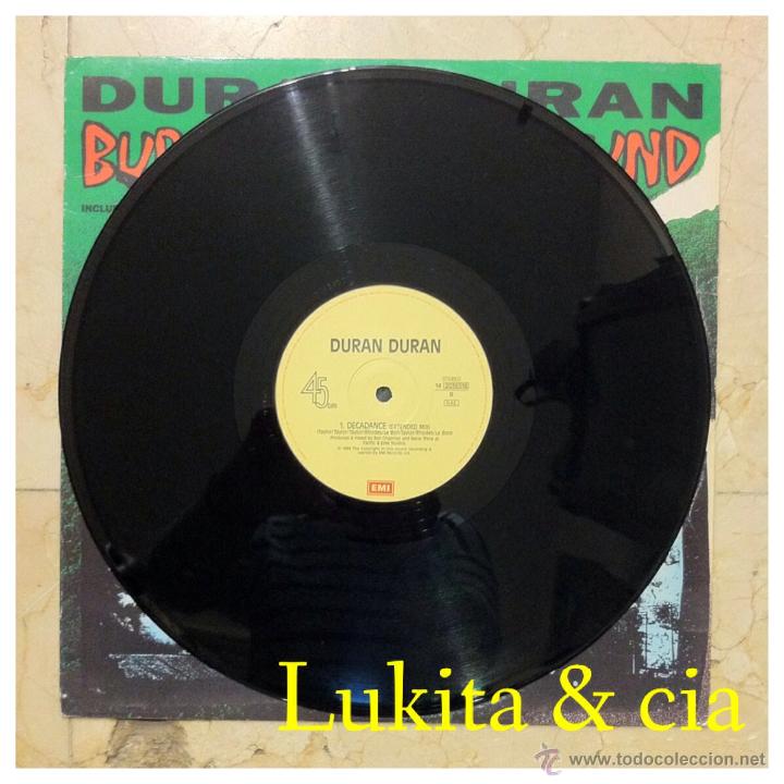 Discos de vinilo: DURAN DURAN - BURNING THE GROUND - MAXI SINGLE - EMI 1989. - Foto 4