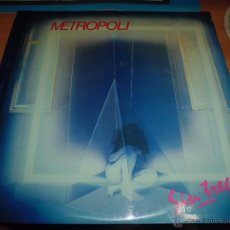Discos de vinilo: METROPOLI - SIN TREGUA FONODISC 1986 CON ENCARTE Y TARJETA FIRMADA POR EL GRUPO EXCELENTE ESTADO