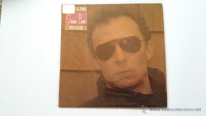 Discos de vinilo: GRAHAM PARKER - START A FIRE / SUCCESS (1988) - Foto 1
