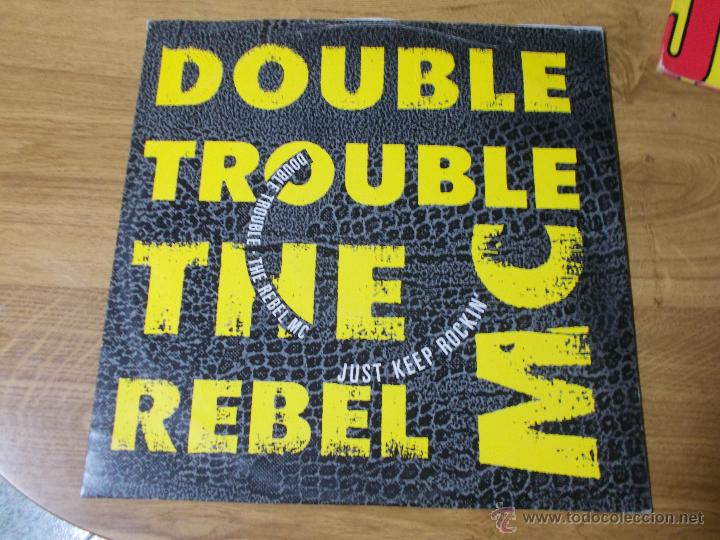 Discos de vinilo: DOUBLE TROUBLE THE REBEL MC  MAXI 12 - Foto 1