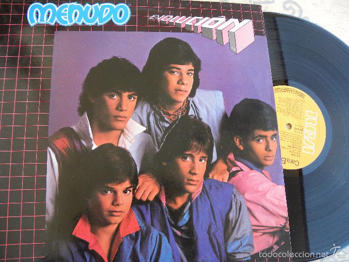 Discos de vinilo: MENUDO -EVOLUCION -LP 1984 - Foto 1