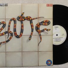 Discos de vinilo: LOOK OUT BAD NEWS TRAVELS FAST LP VINYL MADE IN SPAIN 1980