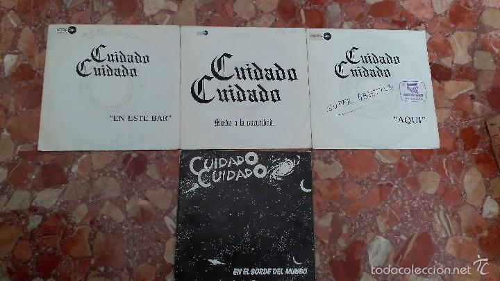 Discos de vinilo: LOTE 4 SINGLES CUIDADO CUIDADO - Foto 1