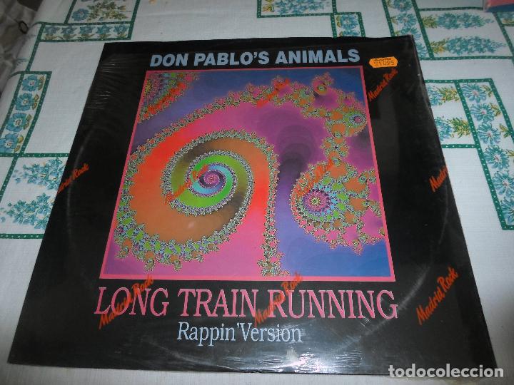 Discos de vinilo: DON PABLOS ANIMALS LONG TRAIN RUNNING - Foto 1