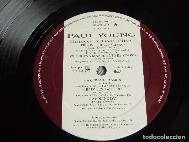 Discos de vinilo: PAUL YOUNG ( BETWEEN TWO FIRES ) 1986-HOLANDA LP33 CBS - Foto 6