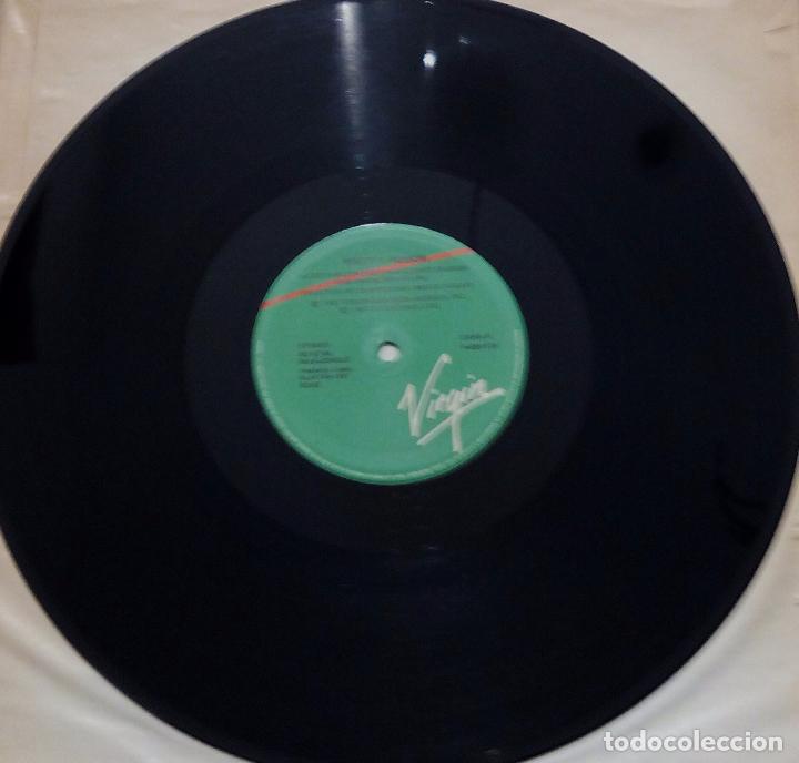 Discos de vinilo: MAXI SINGLE PRETTY POISON - CATCH ME (IM FALLING) - VIRGIN 1987. - Foto 4