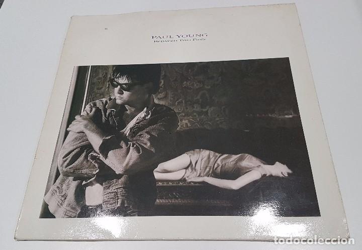 Discos de vinilo: VINILO LP , PAUL YOUNG , BETWEEN TWO FIRES - Foto 1
