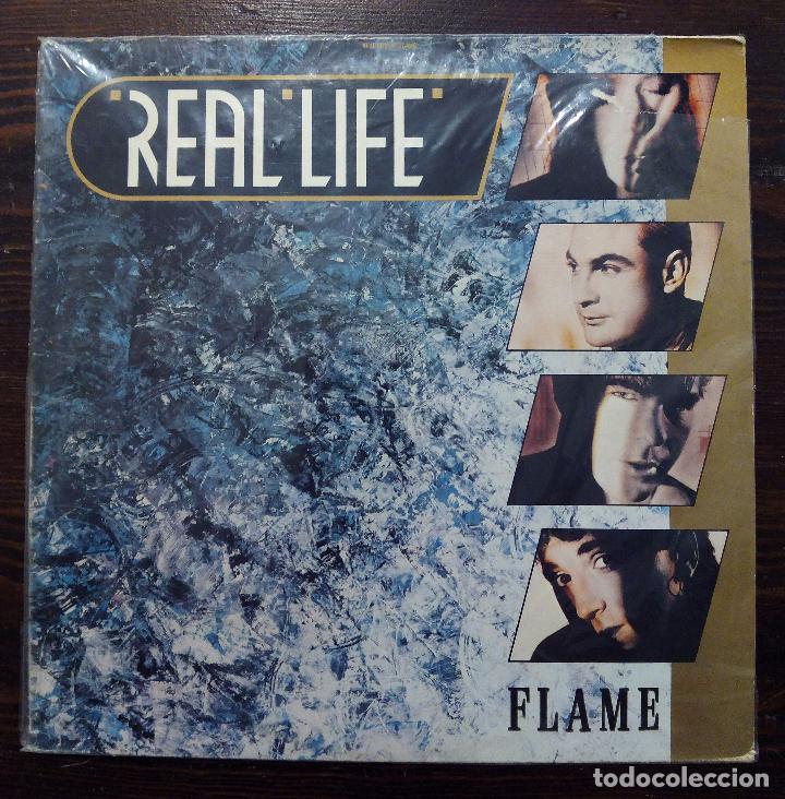 Discos de vinilo: LP REAL LIFE - FLAME - ARIOLA 1985. - Foto 1