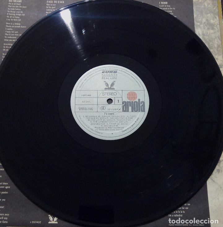 Discos de vinilo: LP REAL LIFE - FLAME - ARIOLA 1985. - Foto 4
