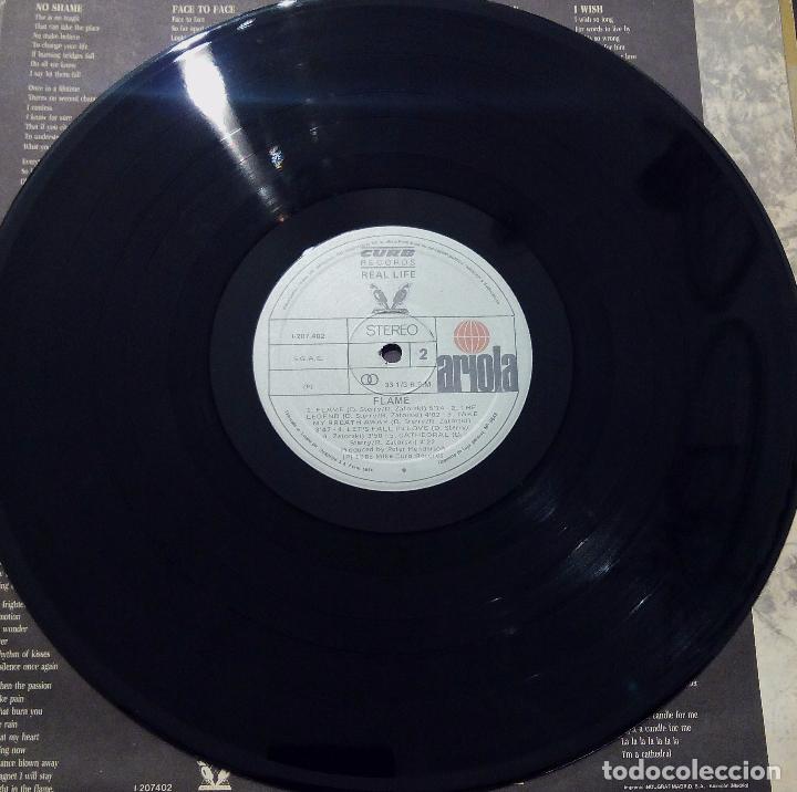 Discos de vinilo: LP REAL LIFE - FLAME - ARIOLA 1985. - Foto 5
