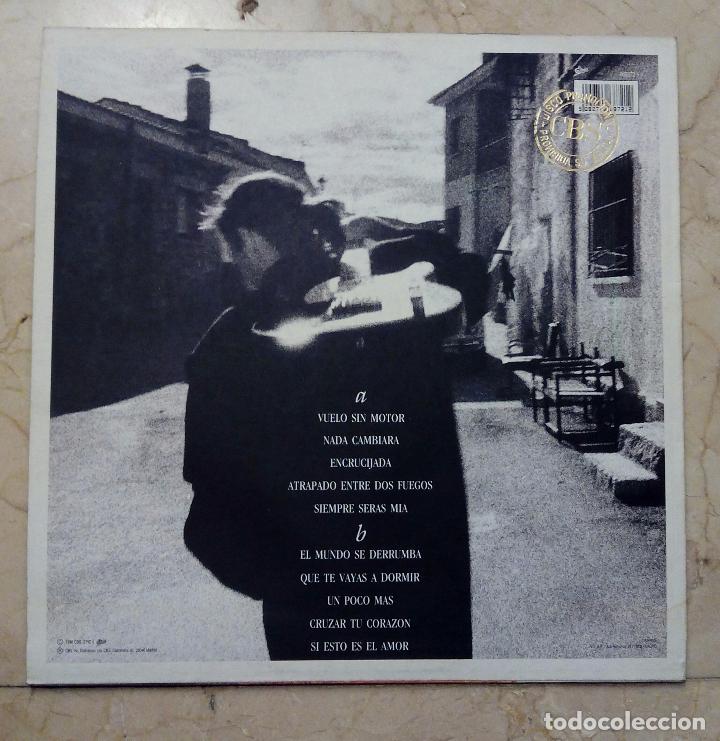 Discos de vinilo: LP ARANGO - VUELO SIN MOTOR - EPIC 1990. - Foto 2