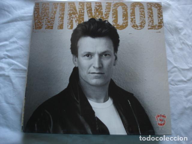 Discos de vinilo: Steve Winwood  Roll With It - Foto 1