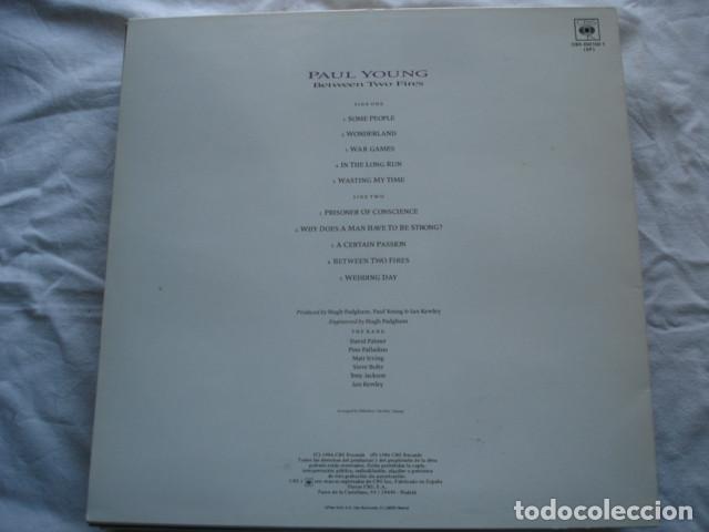 Discos de vinilo: Paul Young   Between Two Fires - Foto 2
