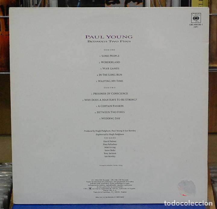 Discos de vinilo: Paul Young. Between two fires. CBS 1986, ref. 450150 1. LP - Foto 2