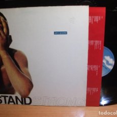 Discos de vinilo: JUNIOR GISCOMBE STAND STRONG LP GERMANY 1990 PDELUXE. Lote 114213247