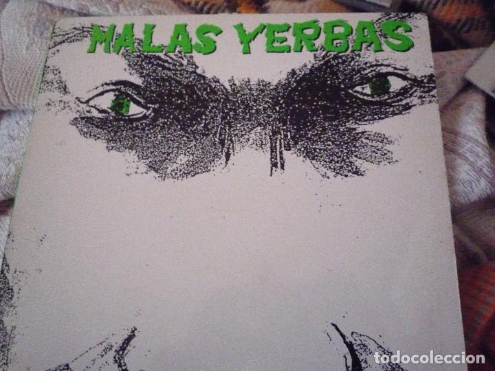Discos de vinilo: MALAS YERBAS-PROMESAS Y PALABRAS - Foto 1