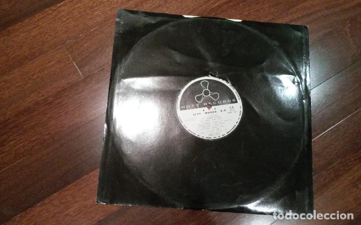 Discos de vinilo: E.C.2-city moods e.p.maxi - Foto 1