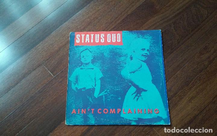 Discos de vinilo: Status quo-aint complaining.maxi espa&ntilde;a - Foto 1