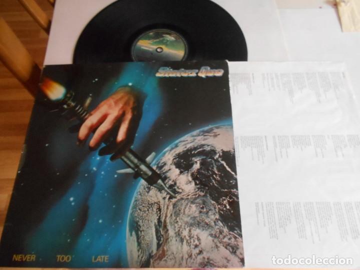 Discos de vinilo: STATUS QUO-LP NEVER TOO LATE-LETRAS - Foto 1