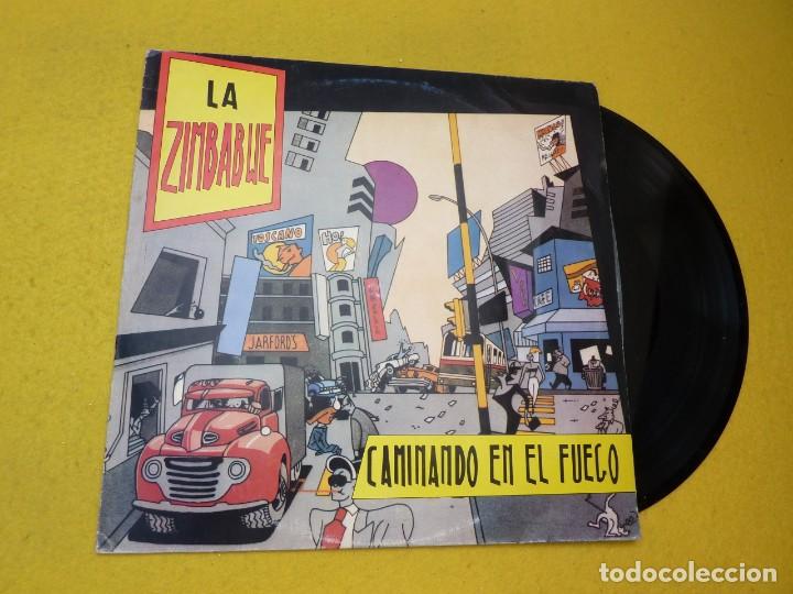 Disques de vinyle: La Zimbabwe &lrm;&ndash; Caminando En El Fuego (EX-/EX-) Argentina press Vinilo Lp
