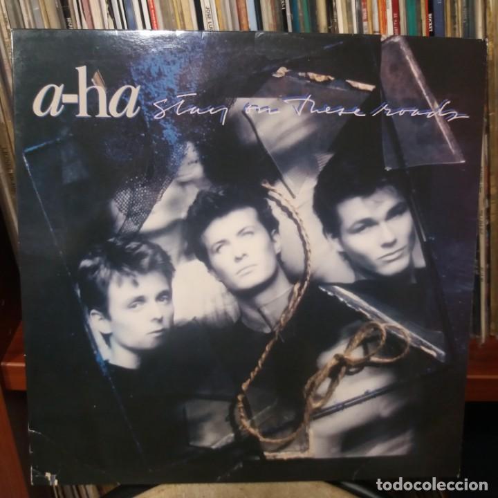 Discos de vinilo: A-HA STAY ON THESE ROADS - Foto 1