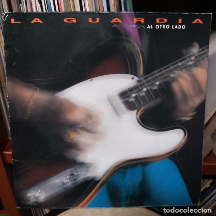 Discos de vinilo: LA GUARDIA - AL OTRO LADO - Foto 1